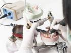 Ремонт зубных протезов